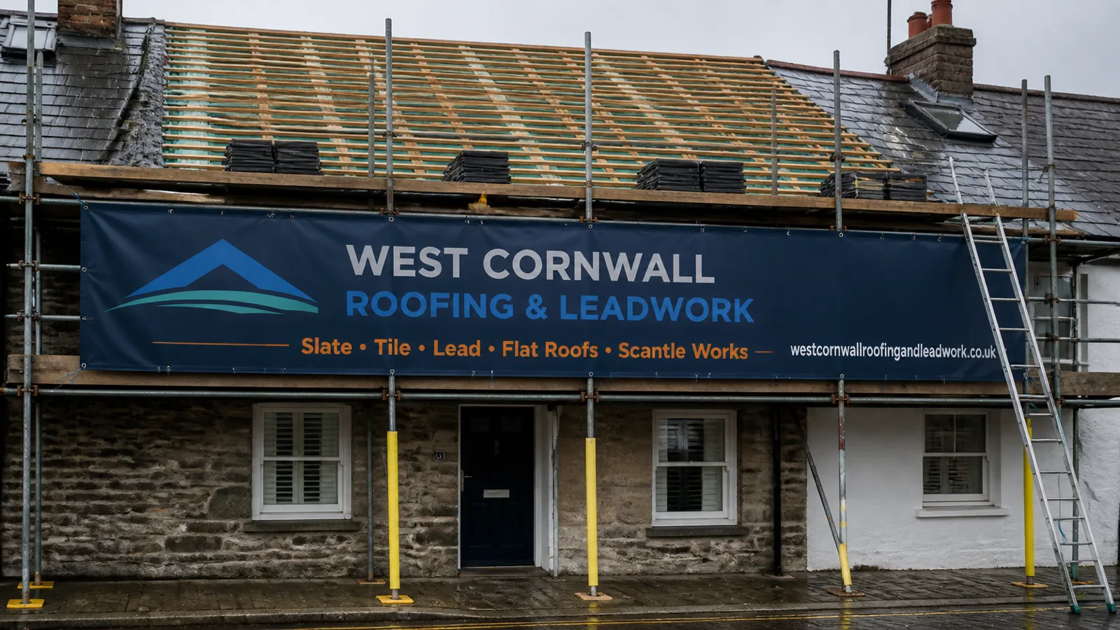 West Cornwall Roofing & Leadwork banner on scaffolding at a live job