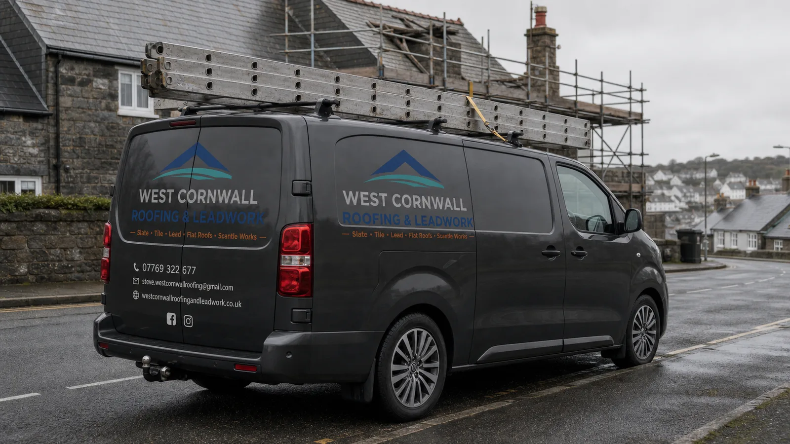 Rear view of the sign-written West Cornwall Roofing & Leadwork van parked by scaffolding on a Cornish street