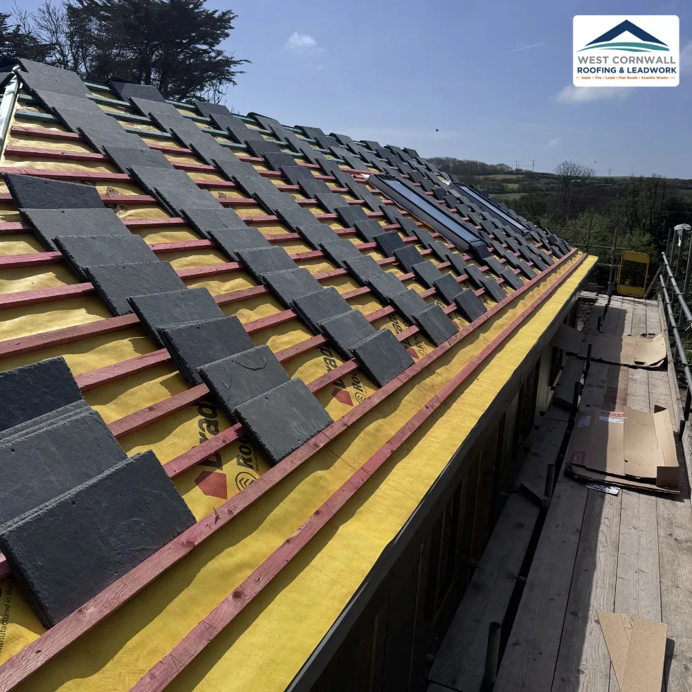 Re-roof, natural slate going on